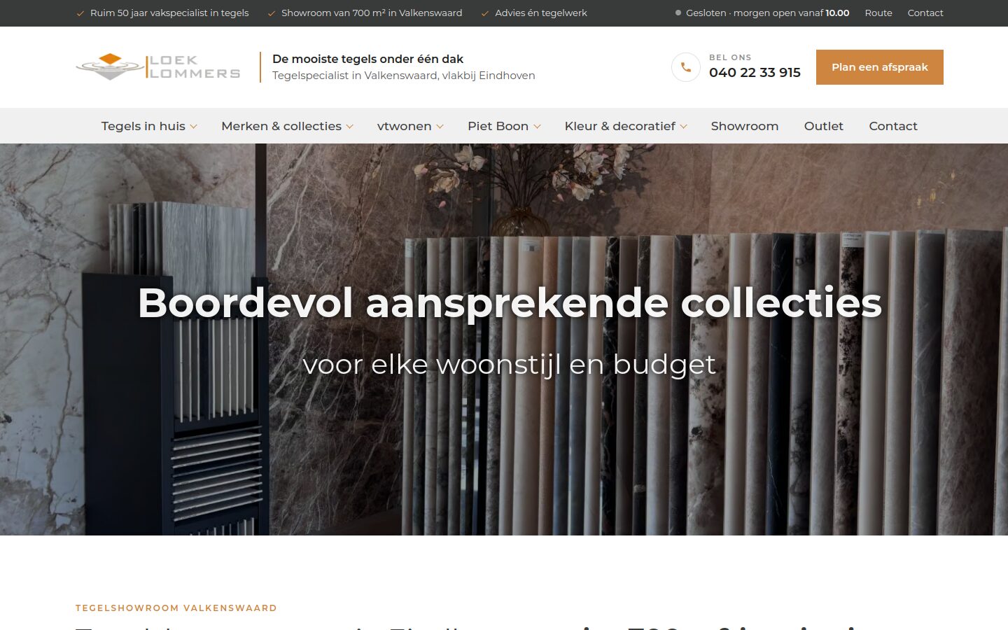 Website van Loek Lommers Tegels op een laptop
