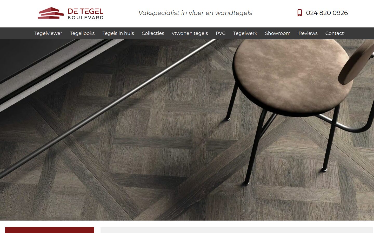 Website van De Tegelboulevard op een laptop